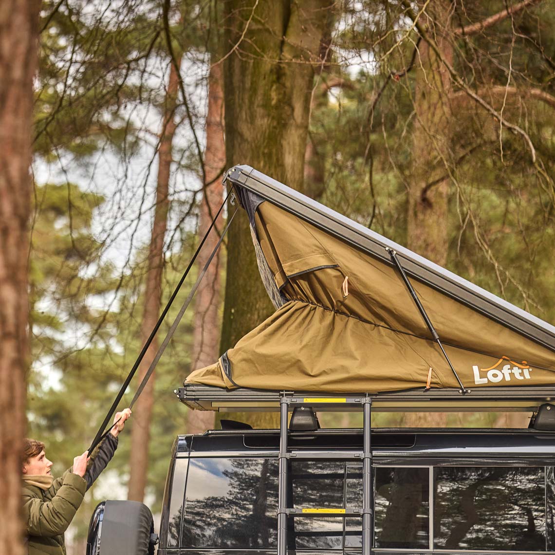Lofti Millie rooftop tent at a forest basecamp