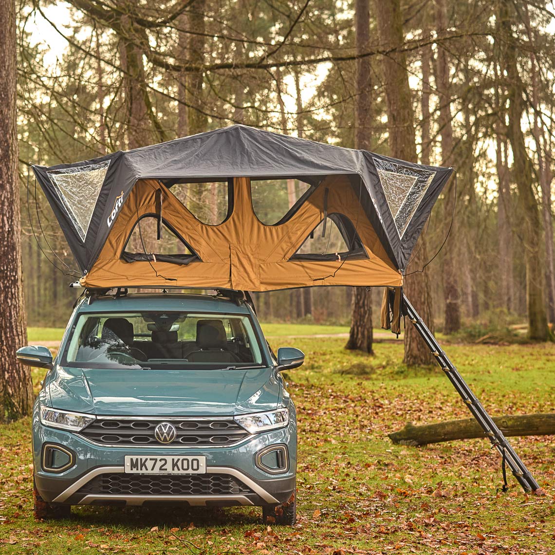 Lofti Bertha rooftop tent with ladder, forest campsite